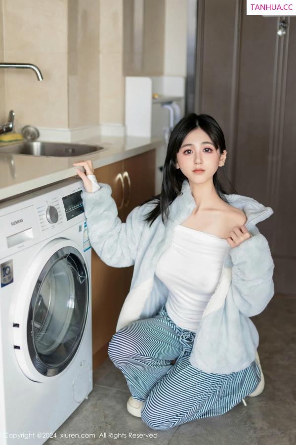   [XiuRen]高清写真图 2024.12.16 No.9605 奶芙乔乔 美腿黑丝第24张图片